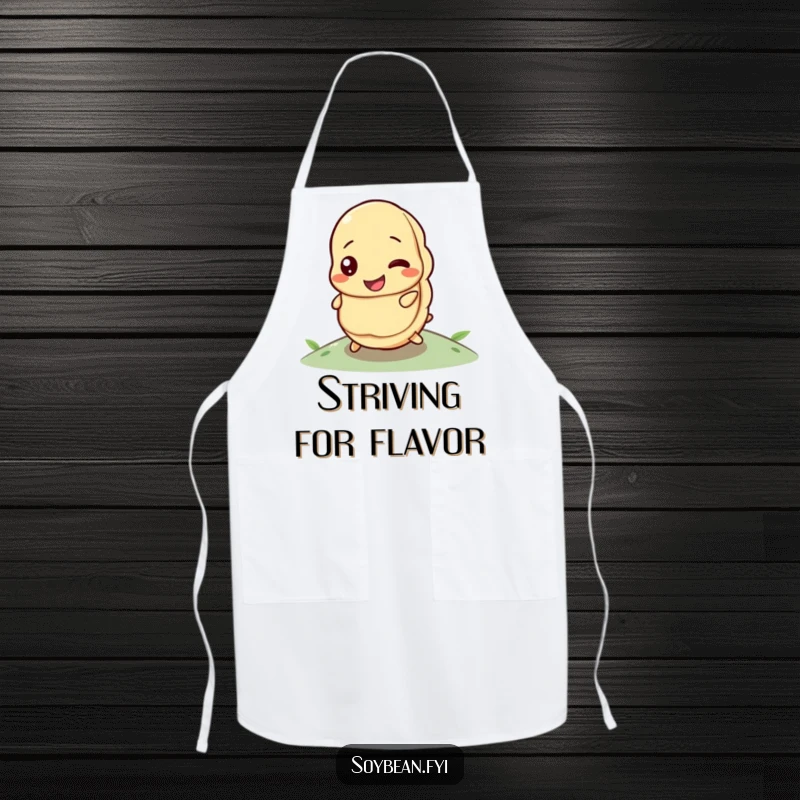 Funny apron showing a happy soybean with a determined look, rolling uphill while cooking.