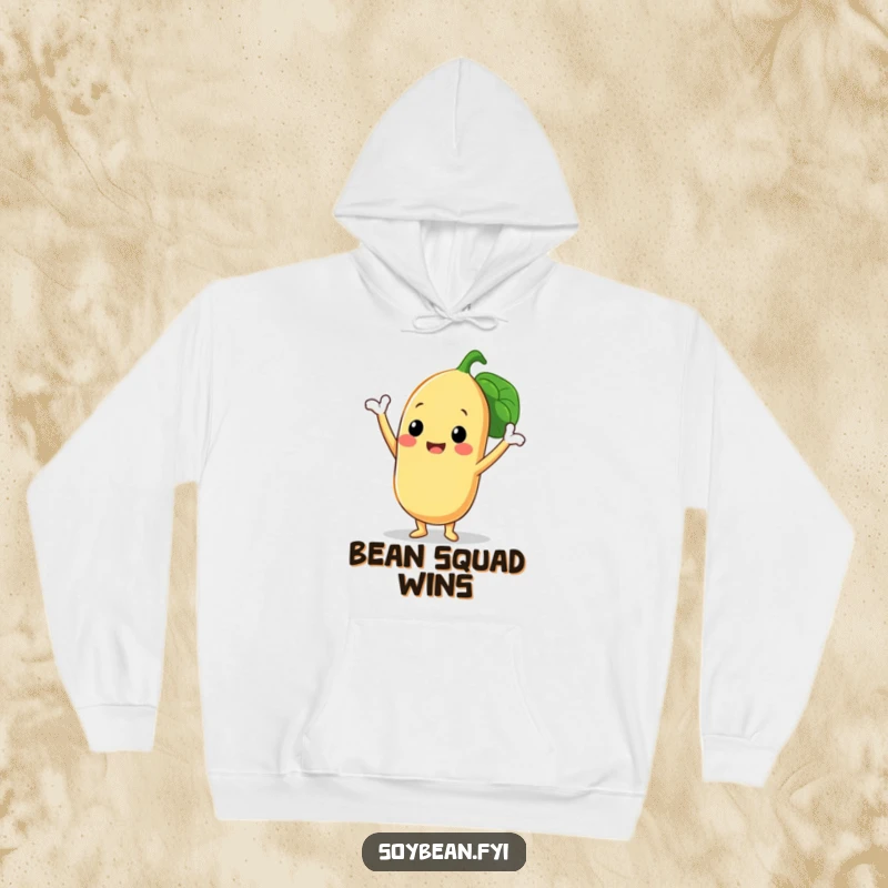 Funny hoodie featuring a smiling soybean character striking a triumphant pose with its three bean pods, radiating warmth and humorous accomplishment.