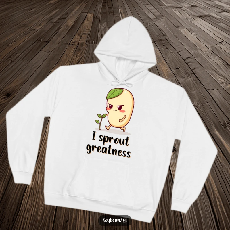 Funny hoodie showing a focused soybean character exerting effort to push a tiny sprout, perfect for gardening or motivational humor.