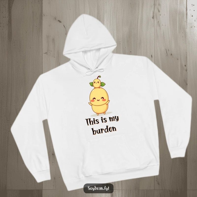 Funny kawaii soybean character mom balancing a baby soybean on its head, depicted on a cozy hoodie.